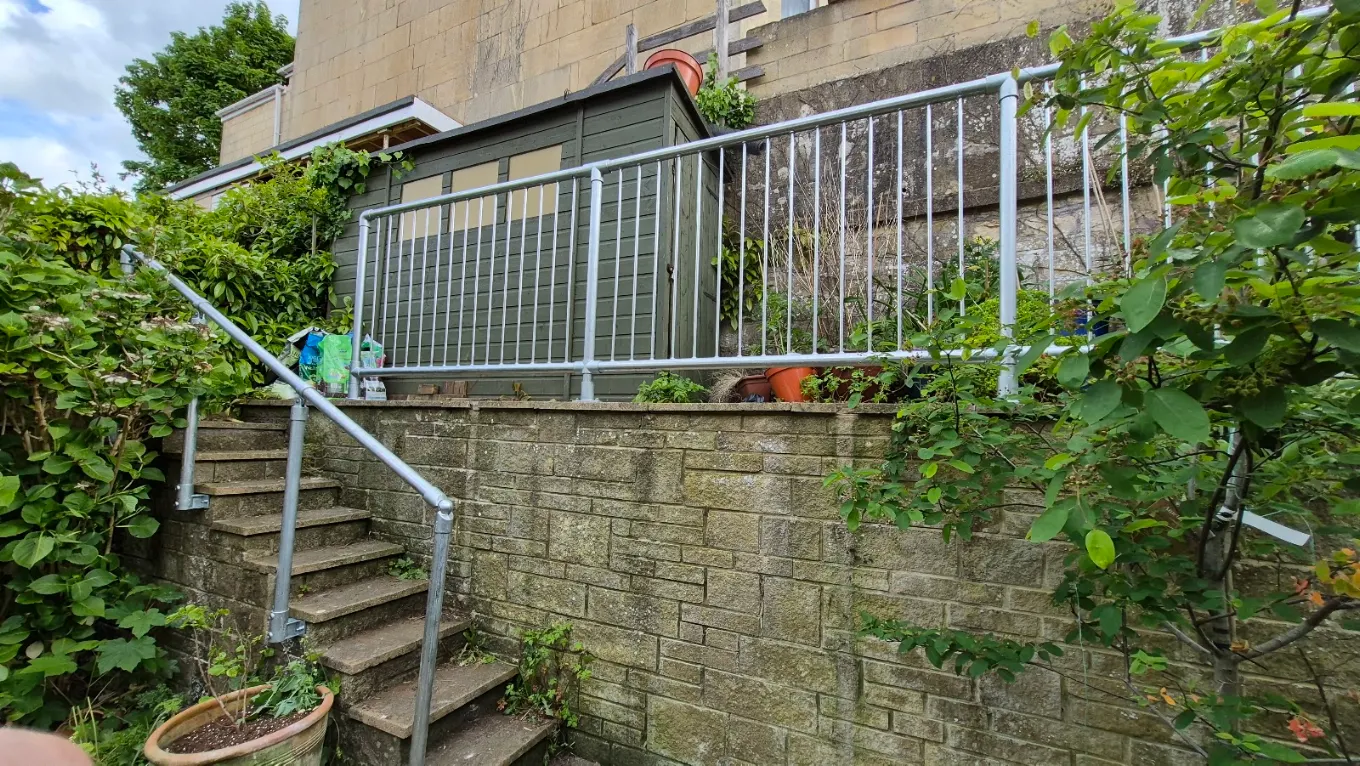 Galvanised steel handrails and guarding fitted to garden steps
