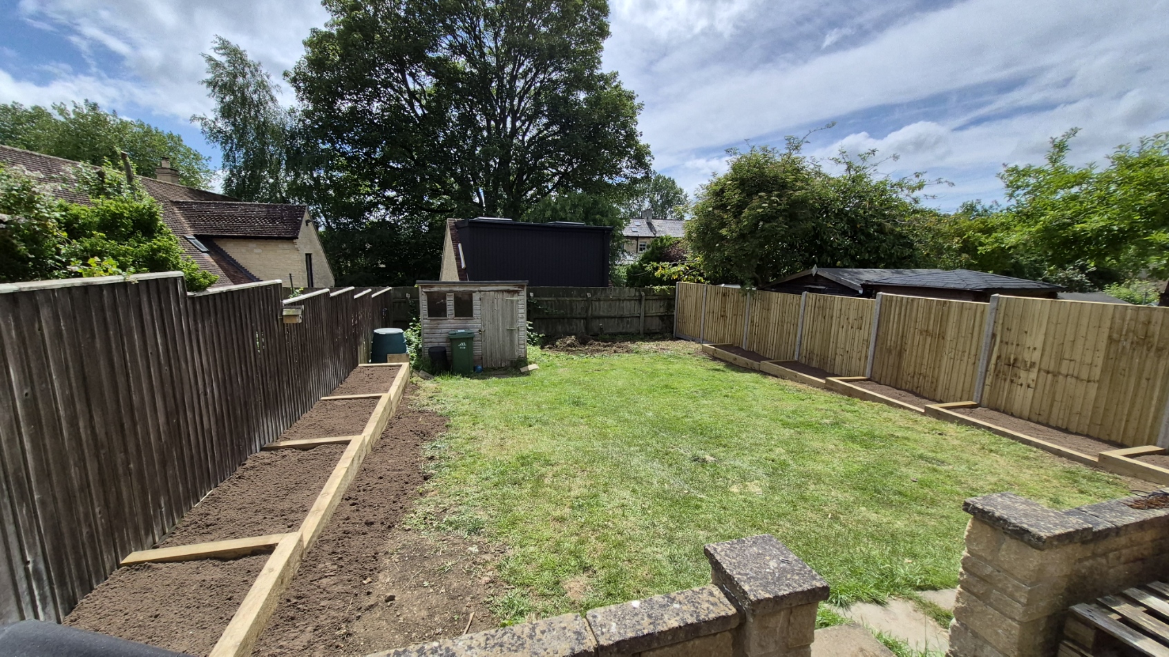 Rear garden borders and fencing — after